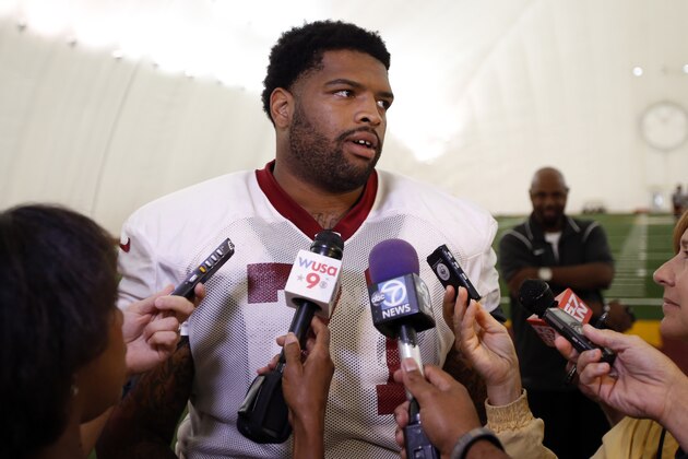 Washington Redskins tackle Trent Williams (71) speaks to reporters after NFL football practice, Tuesday, Aug. 18, 2015, in Ashburn, Va. (AP Photo/Alex Brandon)