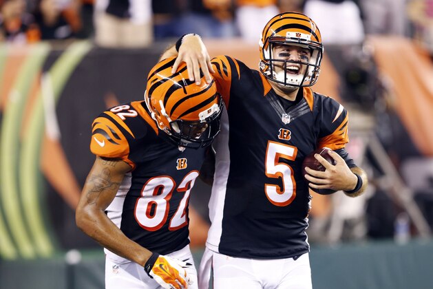 Aug 29, 2015; Cincinnati, OH, USA; Cincinnati Bengals wide receiver Marvin Jones (82) celebrates with quarterback AJ McCarron (5) after scoring a touchdown in the first half against the Chicago Bears in a preseason NFL football game at Paul Brown Stadium. Mandatory Credit: Aaron Doster-USA TODAY Sports