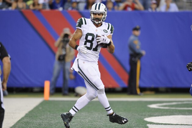 New York Jets wide receiver Eric Decker (87) catches a pass for a touchdown during the first half of a preseason NFL football game against the New York Giants Saturday, Aug. 29, 2015  in East Rutherford, N.J. (AP Photo/Bill Kostroun)