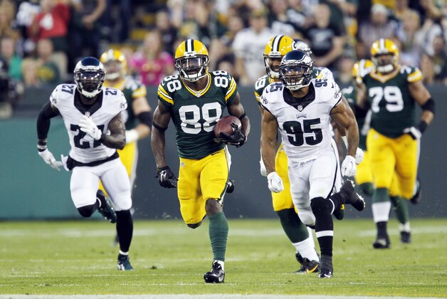 Green Bay Packers' Ty Montgomery runs after a catch during the first half of an NFL football game against the Philadelphia Eagles Saturday, Aug. 29, 2015, in Green Bay, Wis. (AP Photo/Matt Ludtke)
