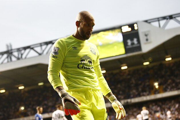 Everton's US goalkeeper Tim Howard leaves the pitch at the end of the English Premier League football match between Tottenham Hotspur and Everton at White Hart Lane in north London on August 29, 2015. AFP PHOTO / JUSTIN TALLIS

RESTRICTED TO EDITORIAL USE. No use with unauthorized audio, video, data, fixture lists, club/league logos or 'live' services. Online in-match use limited to 75 images, no video emulation. No use in betting, games or single club/league/player publications.        (Photo credit should read JUSTIN TALLIS/AFP/Getty Images)