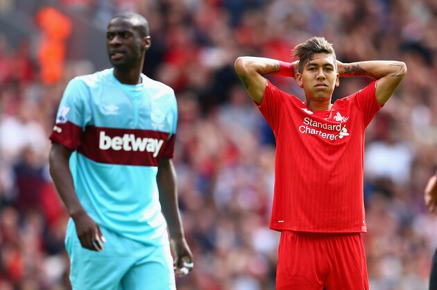 LIVERPOOL, ENGLAND - AUGUST 29:  Roberto Firmino of Liverpool rues a missed opportunity during the Barclays Premier League match between Liverpool and West Ham United at Anfield on August 29, 2015 in Liverpool, United Kingdom.  (Photo by Clive Mason/Getty Images)