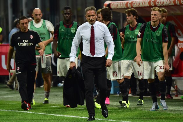 AC Milan's coach from Serbia Sinisa Mihajlovic leaves the pitch during the Italian Serie A football match between AC Milan and Empoli  at San Siro Stadium in Milan on August 29, 2015. AFP PHOTO / GIUSEPPE CACACE        (Photo credit should read GIUSEPPE CACACE/AFP/Getty Images)