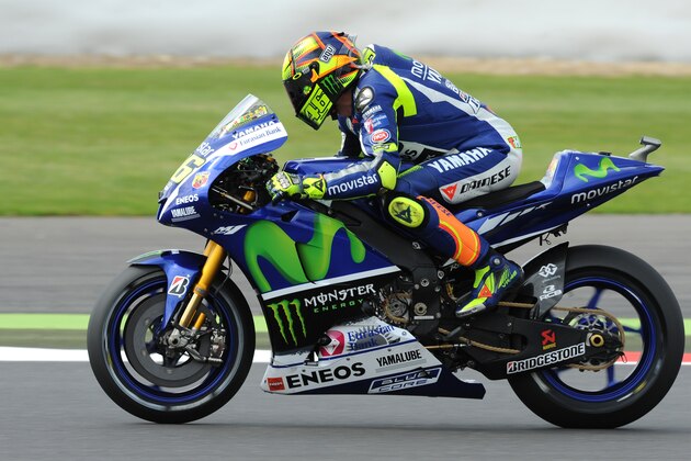 Italy’s Valentino Rossi of Movistar Yamaha finishes in fourth position during Moto GP qualifying at the British Grand Prix at Silverstone, England, Saturday, Aug. 29, 2015. (AP Photo/Rui Vieira)