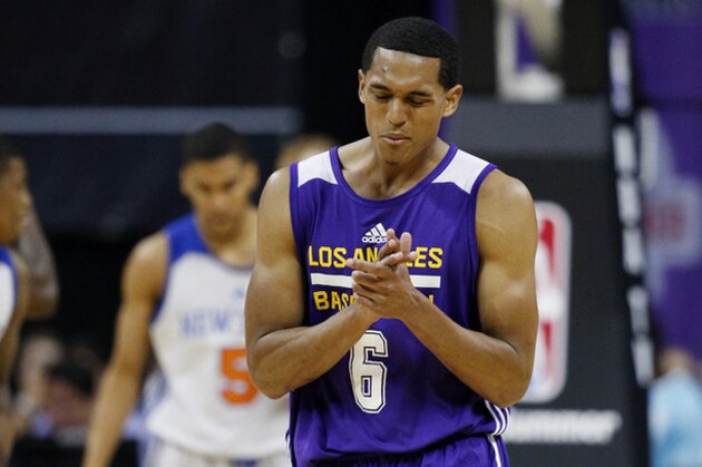 Los Angeles Lakers’ Jordan Clarkson reacts after a play against the New York Knicks during the second half of an NBA summer league basketball game Monday, July 13, 2015, in Las Vegas. (AP Photo/John Locher)