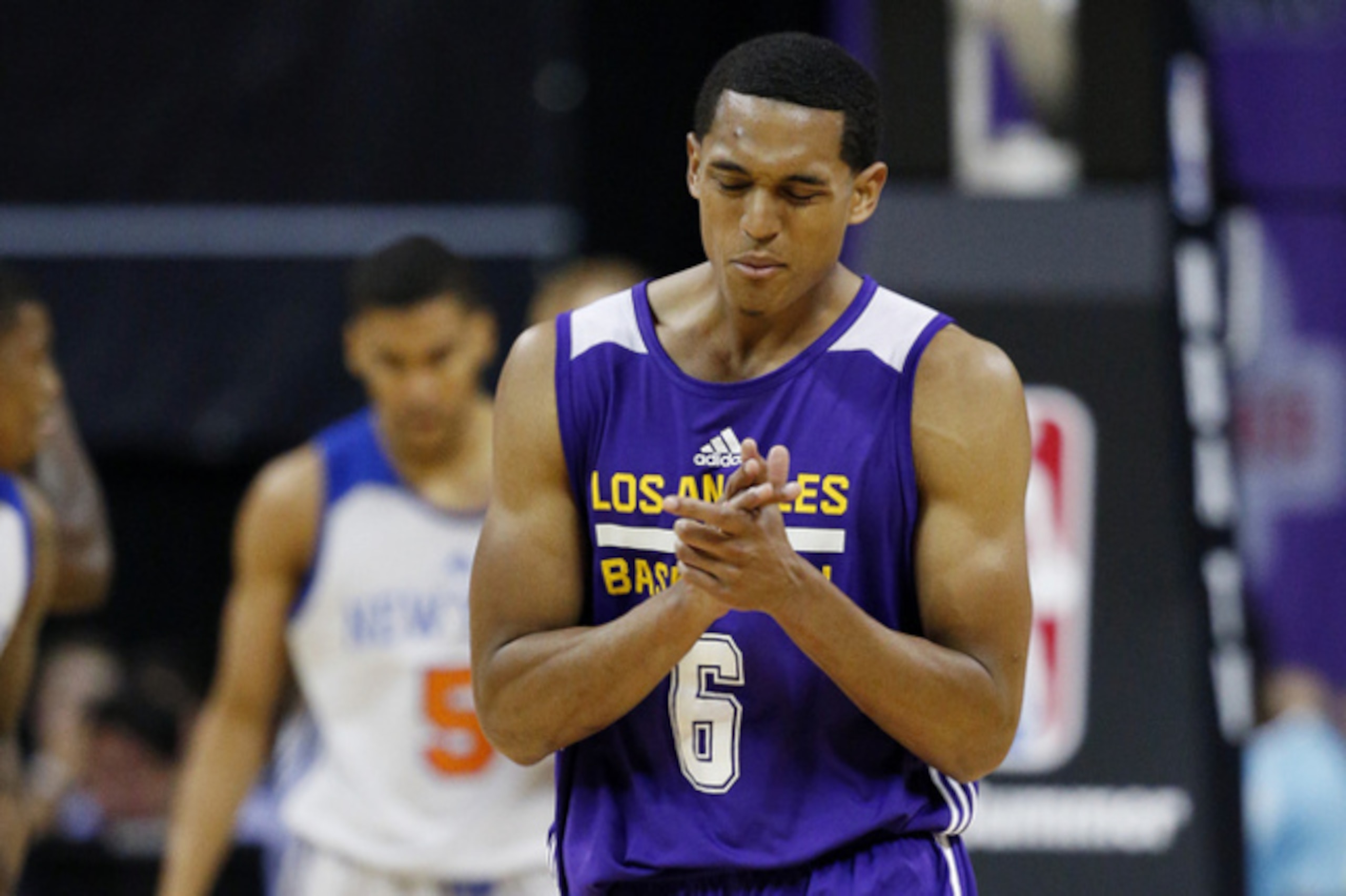 Los Angeles Lakers’ Jordan Clarkson reacts after a play against the New York Knicks during the second half of an NBA summer league basketball game Monday, July 13, 2015, in Las Vegas. (AP Photo/John Locher)