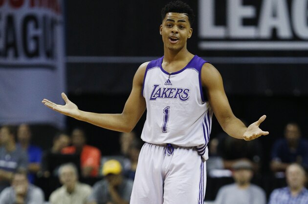 Los Angeles Lakers’ D'Angelo Russell reacts after scoring against the Minnesota Timberwolves during the first half of their NBA summer league basketball game Friday, July 10, 2015, in Las Vegas. (AP Photo/John Locher)