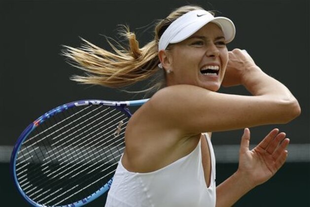 ADVANCE FOR WEEKEND EDITIONS, AUG. 29-30  - FILE - In this July 3, 2015, file photo, Maria Sharapova returns a ball to Irina-Camelia Begu during their singles match at the All England Lawn Tennis Championships in Wimbledon, London. Sharapova is seeded third for the U.S. Open tennis tournament. (AP Photo/Pavel Golovkin, File)