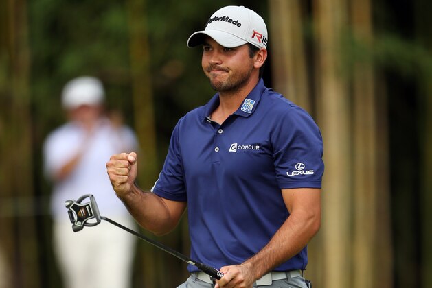 Jason Day, of Australia, reacts after hitting a birdie putt on the 14th green during the final round of play at The Barclays golf tournament Sunday, Aug. 30, 2015, in Edison, N.J. Day finished 19 under with a 261 total. (AP Photo/Adam Hunger)