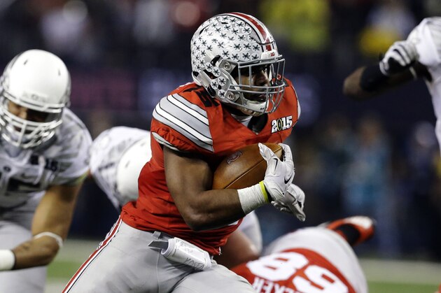 Ohio State's Ezekiel Elliott runs during the second half of the NCAA college football playoff championship game against Oregon Monday, Jan. 12, 2015, in Arlington, Texas. (AP Photo/LM Otero)