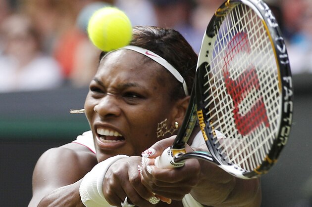FILE- In this July 1, 2010, file photo, Serena Williams of the United States, hits a return to Petra Kvitova of the Czech Republic, at the All England Lawn Tennis Championships at Wimbledon. In a statement e-mailed to the AP by her agent, the younger Williams says Tuesday she