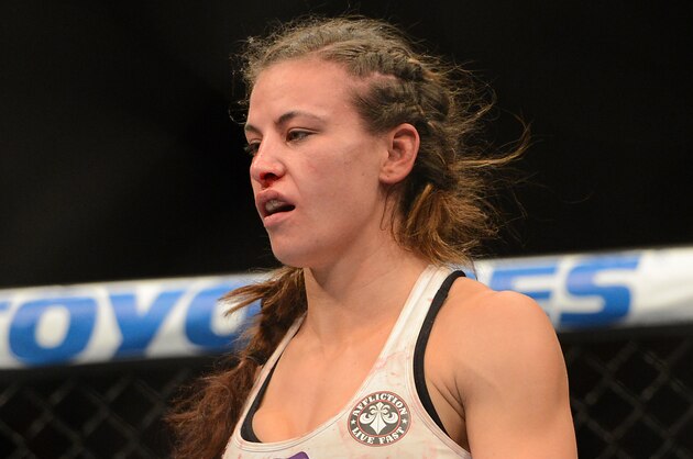 Dec 28, 2013; Las Vegas, NV, USA;   Miesha Tate in the cage after being defeated by Ronda Rousey (not pictured) in their UFC Women's Bantamweight Championship Bout at the MGM Grand Garden Arena. Rousey won with an arm bar in the third round. Mandatory Credit: Jayne Kamin-Oncea-USA TODAY Sports