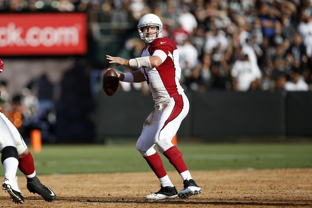 Arizona Cardinals quarterback Carson Palmer (3) against the Oakland Raiders during the first half of an NFL preseason football game in Oakland, Calif., Sunday, Aug. 30, 2015. (AP Photo/Tony Avelar)