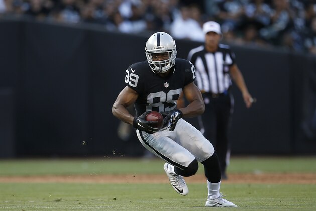 Oakland Raiders wide receiver Amari Cooper (89) against the Arizona Cardinals during the first half of an NFL preseason football game in Oakland, Calif., Sunday, Aug. 30, 2015. (AP Photo/Tony Avelar)