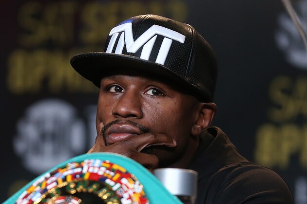 LOS ANGELES, CA - AUGUST 06:  Floyd Mayweather listens at a press conference ahead of his upcoming fight with Andre Berto at JW Marriott Los Angeles at L.A. LIVE on August 6, 2015 in Los Angeles, California.  (Photo by Stephen Dunn/Getty Images)