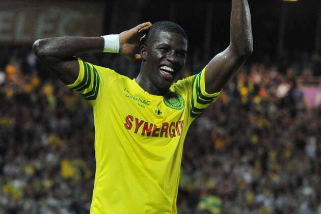 TO GO WITH AFP STORY
(FILES) Photo taken on 5 October, 2013 in La Beaujoire stadium in Nantes shows Nantes' Papy Djilobodji celebrating scoring during the French L1 football match Nantes against Evian-Thonon. AFP PHOTO/FRANK PERRY        (Photo credit should read FRANK PERRY/AFP/Getty Images)