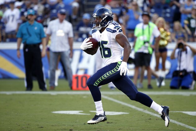 Seattle Seahawks wide receiver Tyler Lockett runs against the San Diego Chargers during the first half of an NFL preseason football game Saturday, Aug. 29, 2015, in San Diego. (AP Photo/Lenny Ignelzi)