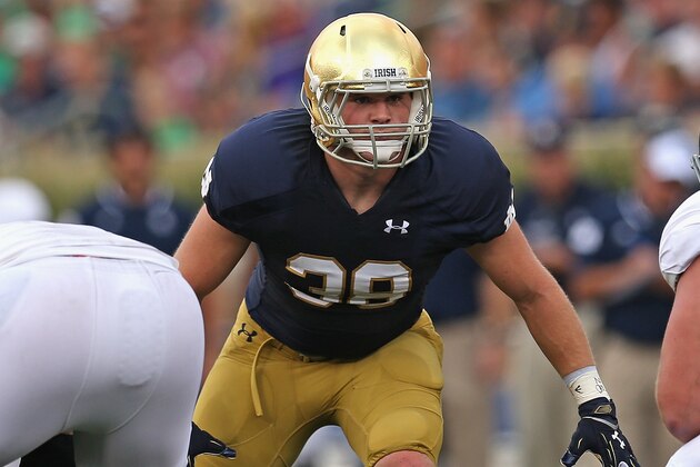 SOUTH BEND, IN - AUGUST 30: Joe Schmidt #38 of the Norte Dame Fighting Irish awaits the snap against the Rice Owls at Notre Dame Stadium on August 30, 2014 in South Bend, Indiana. Notre Dame defeated Rice 48-17.  (Photo by Jonathan Daniel/Getty Images)