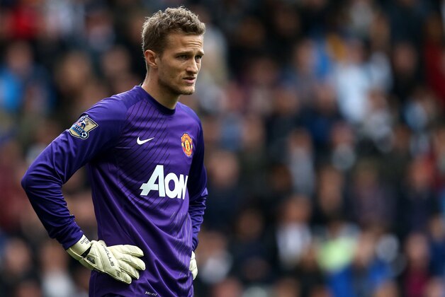 Manchester United's goalkeeper Anders Lindegaard during their English Premier League soccer match against Newcastle United at St James' Park, Newcastle, England, Saturday, April 5, 2014. (AP Photo/Scott Heppell)
