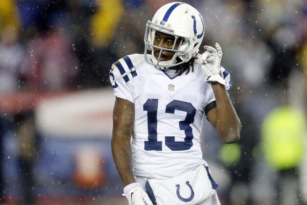 Indianapolis Colts wide receiver T.Y. Hilton walks off the field after an interception by the New England Patriots during the second half of the NFL football AFC Championship game Sunday, Jan. 18, 2015, in Foxborough, Mass. (AP Photo/Julio Cortez)