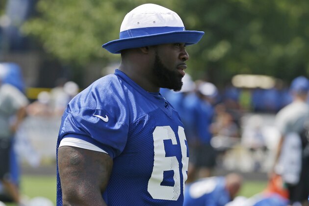 Indianapolis Colts guard Donald Thomas (66) walks on to the field during the NFL team's football training camp in Anderson, Ind., Monday, Aug. 3, 2015.  (AP Photo/Michael Conroy)