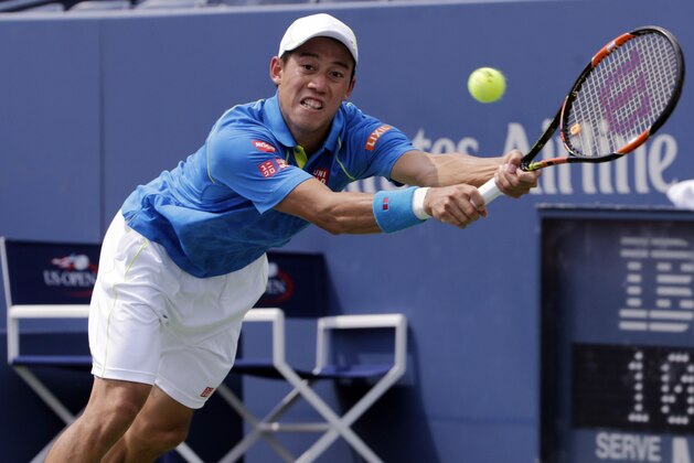 Kei Nishikori, of Japan, returns a shot to Benoit Paire, of France, during the first round of the U.S. Open tennis tournament, Monday, Aug. 31, 2015, in New York. (AP Photo/Charles Krupa)