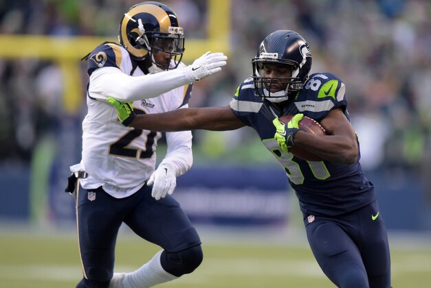 Dec 28, 2014; Seattle, WA, USA; Seattle Seahawks receiver Kevin Norwood (81) is defended by St. Louis Rams cornerback Janoris Jenkins (21) on a 31-yard reception in the fourth quarter at CenturyLink Field. The Seahawks defeated the Rams 20-6 to clinch the NFC West division title. Mandatory Credit: Kirby Lee-USA TODAY Sports