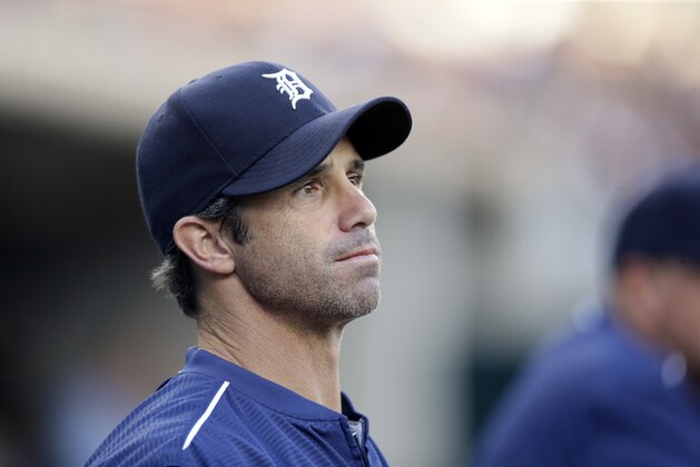 Detroit Tigers manager Brad Ausmus watches from the dugout during the first inning of a baseball game against the Kansas City Royals, Tuesday, Aug. 4, 2015, in Detroit. (AP Photo/Carlos Osorio)