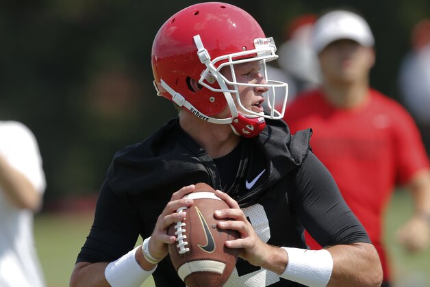 Georgia quarterback Brice Ramsey drops to throw during a college football practice Tuesday, Aug. 4, 2015, in Athens, Ga. (AP Photo/John Bazemore)