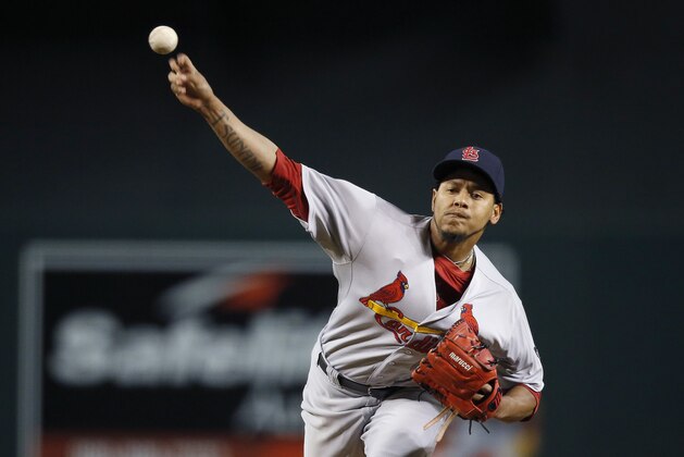 St. Louis Cardinals' Carlos Martinez warms up during the first inning of a baseball game against the Arizona Diamondbacks Thursday, Aug. 27, 2015, in Phoenix. (AP Photo/Ross D. Franklin)
