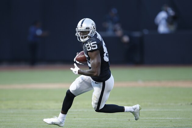Oakland Raiders wide receiver Kenbrell Thompkins (85) against the Arizona Cardinals during the second half of an NFL preseason football game in Oakland, Calif., Sunday, Aug. 30, 2015. (AP Photo/Tony Avelar)
