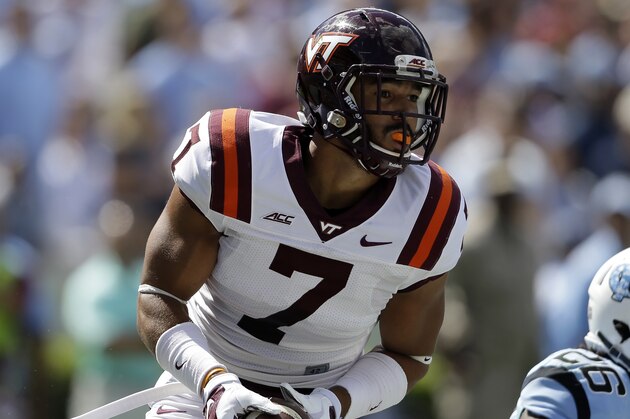 Virginia Tech's Bucky Hodges (7) celebrates his touchdown against North Carolina during the first half of an NCAA college football game in Chapel Hill, N.C., Saturday, Oct. 4, 2014. Virginia Tech won 34-17. (AP Photo/Gerry Broome)