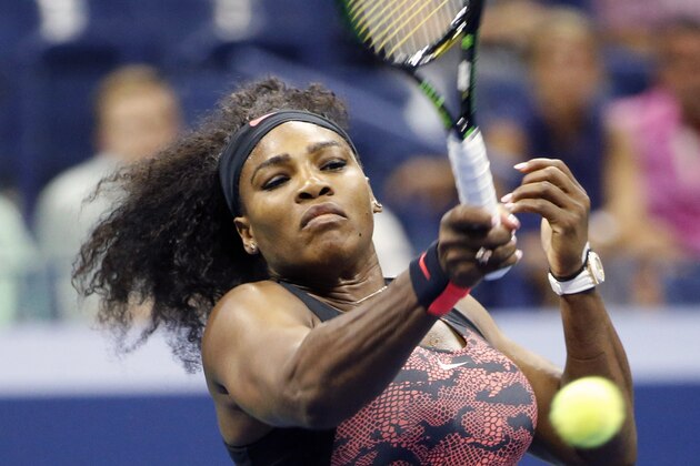 U.S. Open defending champion Serena Williams of the United States returns the ball during her first round match against Vitalia Diatchenko of Russia in the U.S. Open Tennis tournament in New York, Monday, Aug. 31, 2015.  (AP Photo/Kathy Willens)
