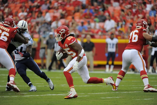 Kansas City Chiefs running back Jamaal Charles (25) carries the ball during the first half of a preseason NFL football game against the Tennessee Titans at Arrowhead Stadium in Kansas City, Mo., Friday, Aug. 28, 2015. (AP Photo/Ed Zurga)