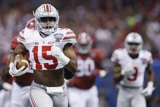 Ohio State running back Ezekiel Elliott (15) runs Alabama in the first half of the Sugar Bowl NCAA college football playoff semifinal game, Thursday, Jan. 1, 2015, in New Orleans. (AP Photo/Brynn Anderson) Ohio State running back Ezekiel Elliott (15) runs Alabama in the first half of the Sugar Bowl NCAA college football playoff semifinal game, Thursday, Jan. 1, 2015, in New Orleans. (AP Photo/Brynn Anderson)