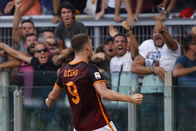 Roma’s Edin Dzeko celebrates after scoring during a Serie A soccer match between Roma and Juventus, at Rome's Olympic stadium, Sunday, Aug. 30, 2015. (AP Photo/Riccardo De Luca)