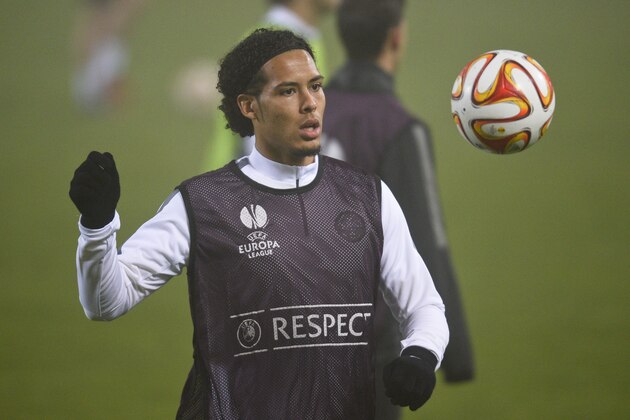 Celtic Glasgow's defender Virgil van Dijk warms up during a training session a day before a Europa League Group D match against Astra Giurgiu, in Bucharest, Romania,Wednesday, Nov. 5, 2014. (AP Photo/Octav Ganea, Mediafax) ROMANIA OUT Celtic Glasgow's defender Virgil van Dijk warms up during a training session a day before a Europa League Group D match against Astra Giurgiu, in Bucharest, Romania,Wednesday, Nov. 5, 2014. (AP Photo/Octav Ganea, Mediafax) ROMANIA OUT