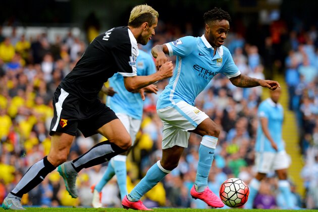 MANCHESTER, ENGLAND - AUGUST 29: Raheem Sterling of Manchester City and Valon Berami of Watford compete for the ball during the Barclays Premier League match between Manchester City and Watford at Etihad Stadium on August 29, 2015 in Manchester, England.  (Photo by Tony Marshall/Getty Images)