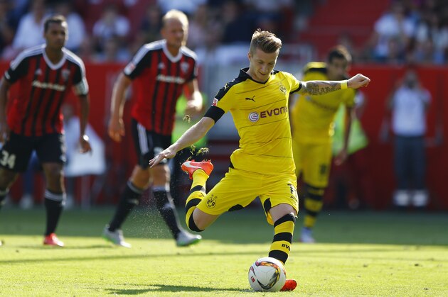 Dortmund's Marco Reus scores his side's second goal from the penalty spot during the German Bundesliga soccer match between FC Ingolstadt 04 and Borussia Dortmund in Ingolstadt, Germany, Sunday, Aug. 23, 2015. (AP Photo/Matthias Schrader) Dortmund's Marco Reus scores his side's second goal from the penalty spot during the German Bundesliga soccer match between FC Ingolstadt 04 and Borussia Dortmund in Ingolstadt, Germany, Sunday, Aug. 23, 2015. (AP Photo/Matthias Schrader)