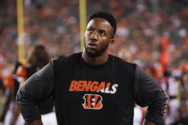Cincinnati Bengals offensive tackle Cedric Ogbuehi stands on the sidelines in the first half of an NFL preseason football game against the Chicago Bears, Saturday, Aug. 29, 2015, in Cincinnati. (AP Photo/Frank Victores)
