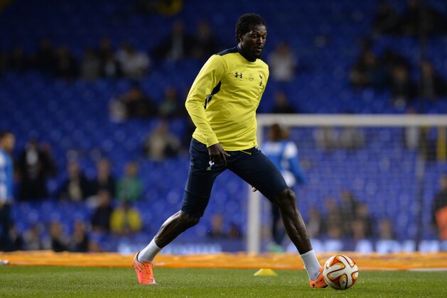 Tottenham Hotspur's Togolese striker Emmanuel Adebayor warms up before the start of the UEFA Europa League group C football match between Tottenham Hotspur and Asteras Tripolis at White Hart Lane in north London, on October 23, 2014. AFP PHOTO / GLYN KIRK        (Photo credit should read GLYN KIRK/AFP/Getty Images)