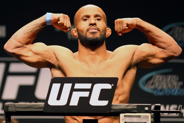 Apr 24, 2015; Montreal, Quebec, CAN; Demetrious Johnson stands on the scale during weigh-ins for UFC 186 at Metropolis. Mandatory Credit: Jean-Yves Ahern-USA TODAY Sports