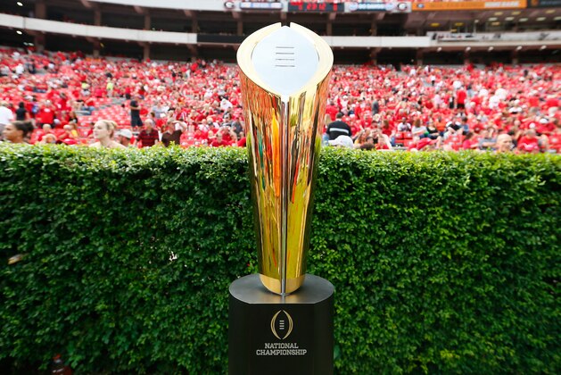 ATHENS, GA - SEPTEMBER 27:  The College Football Playoff National Championship Trophy is seen on the field prior to the game between the Georgia Bulldogs and the Tennessee Volunteers at Sanford Stadium on September 27, 2014 in Athens, Georgia.  (Photo by Kevin C. Cox/Getty Images)