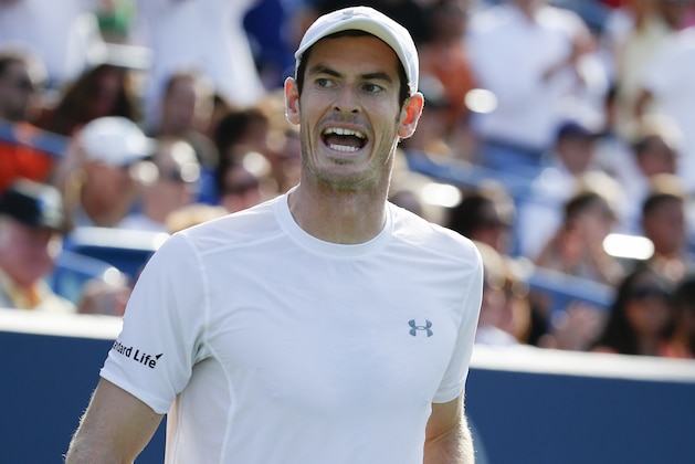 Andy Murray, of Britain, reacts during a semifinal match against Roger Federer, of Switzerland, at the Western & Southern Open tennis tournament, Saturday, Aug. 22, 2015, in Mason, Ohio. Federer won 6-4. 7-6 (6). (AP Photo/John Minchillo)