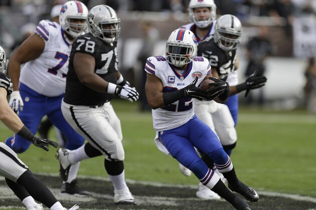 Buffalo Bills running back Fred Jackson (22) runs against the Oakland Raiders during the first quarter of an NFL football game in Oakland, Calif., Sunday, Dec. 21, 2014. (AP Photo/Ben Margot)