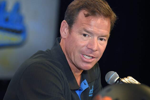 FILE - In this July 30, 2015, file photo, UCLA head coach Jim Mora speaks to reporters during NCAA college Pac-12 Football Media Days in Burbank, Calif. The UCLA Bruins feel they're still searching for national respect even after two straight 10-win seasons and a Top-10 finish last year. They're also looking for a new starting quarterback as they begin training camp practices Monday, Aug. 10, 2015, at Cal State San Bernardino in the sizzling Inland Empire. Practices are open to the public. (AP Photo/Mark J. Terrill, File)