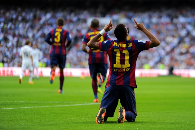 MADRID, SPAIN - OCTOBER 25:  Neymar of FC Barcelona cewlebrates after scoring the opening goal during the La Liga match between Real Madrid CF and FC Barcelona at Estadio Santiago Bernabeu on October 25, 2014 in Madrid, Spain.  (Photo by Denis Doyle/Getty Images)