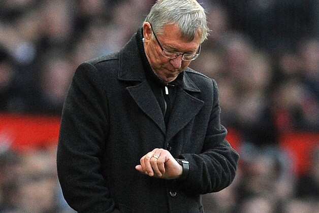 Manchester United's Scottish manager Alex Ferguson checks his watch during the English Premier League football match between Manchester United and Tottenham Hotspur at Old Trafford in Manchester, north-west England on September 29, 2012. AFP PHOTO/ANDREW YATES
RESTRICTED TO EDITORIAL USE. No use with unauthorized audio, video, data, fixture lists, club/league logos or “live” services. Online in-match use limited to 45 images, no video emulation. No use in betting, games or single club/league/player publications (Photo credit should read ANDREW YATES/AFP/GettyImages) Manchester United's Scottish manager Alex Ferguson checks his watch during the English Premier League football match between Manchester United and Tottenham Hotspur at Old Trafford in Manchester, north-west England on September 29, 2012. AFP PHOTO/ANDREW YATES
RESTRICTED TO EDITORIAL USE. No use with unauthorized audio, video, data, fixture lists, club/league logos or “live” services. Online in-match use limited to 45 images, no video emulation. No use in betting, games or single club/league/player publications (Photo credit should read ANDREW YATES/AFP/GettyImages)