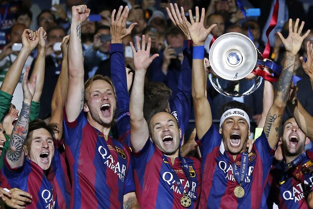 (L-R) Lionel Messi, Ivan Raketic, Andres Iniesta, Neymar of Barcelona celebrating winning the Champions League final during the UEFA Champions League  final match between Barcelona and Juventus on June 6, 2015 at the Olympic stadium in Berlin, Germany.(Photo by VI Images via Getty Images)