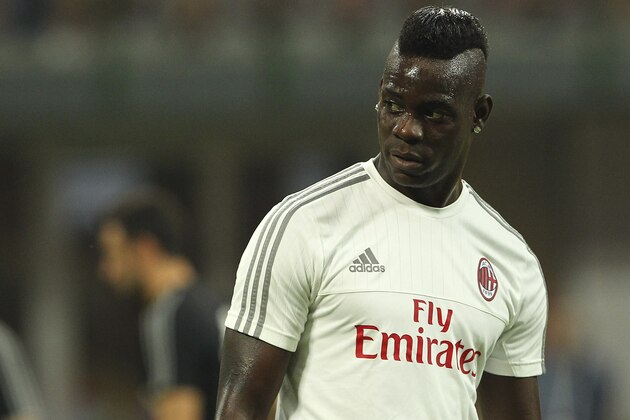 MILAN, ITALY - AUGUST 29:  Mario Balotelli of AC Milan looks on before the Serie A match between AC Milan and Empoli FC at Stadio Giuseppe Meazza on August 29, 2015 in Milan, Italy.  (Photo by Marco Luzzani/Getty Images)
